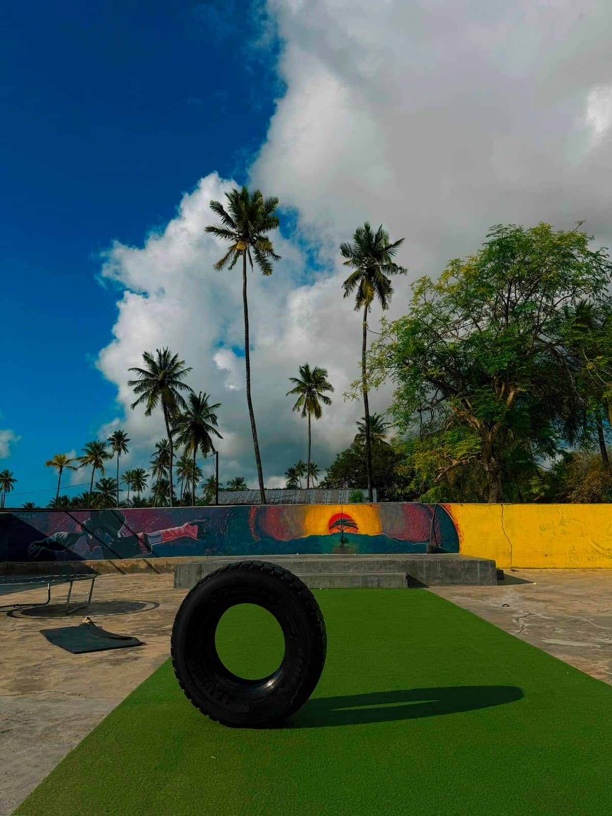 The Move Zanzibar training yard in Jambiani The Move Zanzibar training yard, with its painted mural wall, palm trees, and training equipment on the astroturf